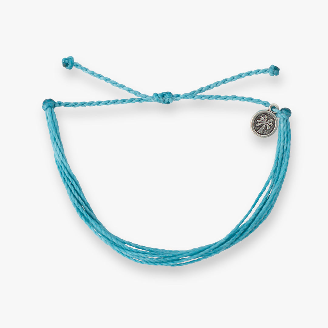 Waterproof Solid 9 Strands bracelet, handcrafted with vibrant colors, perfect for beach days, surfing, and coastal adventures.