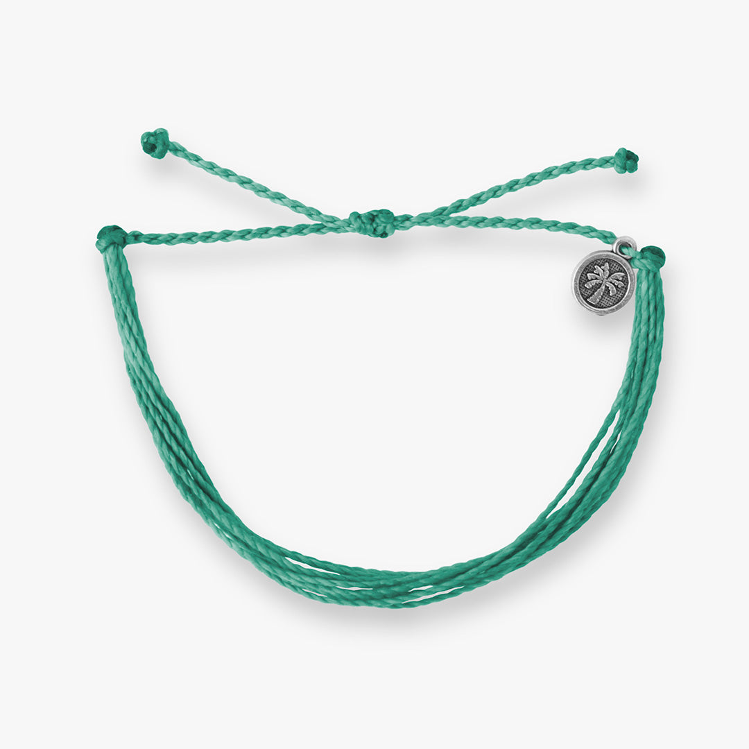 Waterproof Solid 9 Strands bracelet, handcrafted with vibrant colors, perfect for beach days, surfing, and coastal adventures.
